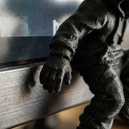 Hooded Climber Monitor Figurine